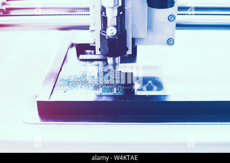 Automated manufacturing process for boards or microchips for electronics or computers. Stock Photo