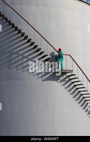 Mining, managing & transporting of titanium mineral sands. Oil storage tanks providing fuel for mine, site, port facilities and shipping. Stock Photo