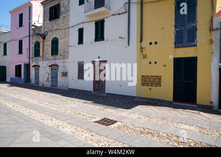 Row of colourful houses along the promenade in Alghero in Sardinia Stock Photo