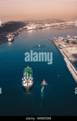 Harbour Mouth with a ship arriving Stock Photo