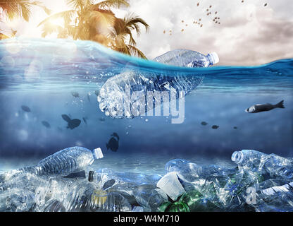 Floating bottle. Problem of plastic pollution under the sea concept Stock Photo