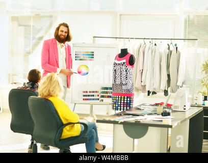 modern designer works on new models in apparel creative Studio Stock Photo