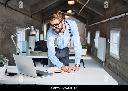 Hipster, businessman working at modern office Stock Photo
