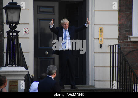 (190724) -- LONDON, July 24, 2019 (Xinhua) -- Newly elected Conservative party leader Boris Johnson poses outside the Conservative Leadership Headquarters in London, Britain, on July 23, 2019. Former British Foreign Secretary and ex-mayor of London Boris Johnson was elected the leader of the ruling Conservative party on Tuesday and set to become the country's prime minister. (Photo by Alberto Pezzali/Xinhua) Stock Photo