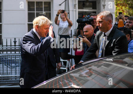 (190724) -- LONDON, July 24, 2019 (Xinhua) -- Newly elected Conservative party leader Boris Johnson leaves his campaign headquarter before the announcement in London, Britain, on July 23, 2019. Former British Foreign Secretary and ex-mayor of London Boris Johnson was elected the leader of the ruling Conservative party on Tuesday and set to become the country's prime minister. (Photo by Alberto Pezzali/Xinhua) Stock Photo