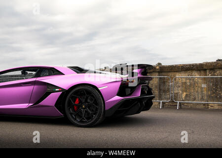 Purple Lamborghini Aventador SVJ Coupe attending annual Salon Prive event held in Oxfordshire, England Stock Photo