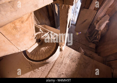 interior of retro wooden watermill with old equipment Stock Photo