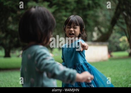 little girls crying sad and angry Stock Photo