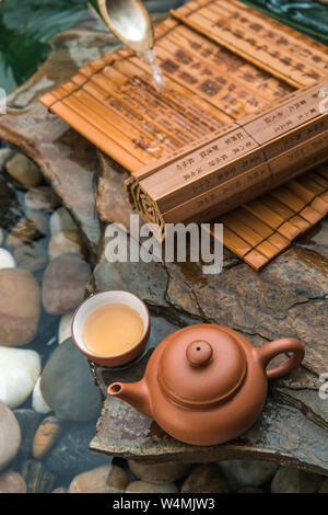 The teapot and bamboo slips Stock Photo