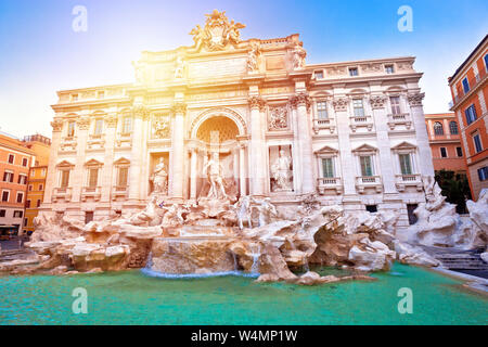 Majestic Trevi fountain in Rome sun haze view, eternal city, capital of Italy Stock Photo