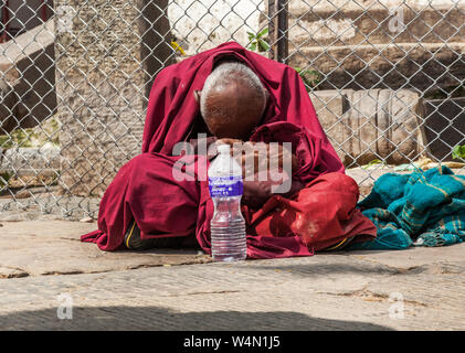 Buddhist monk at Swayambhunath, Kathmandu, Nepal Stock Photo