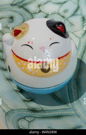 Maneki Neko, Lucky Cat Figurine Stock Photo