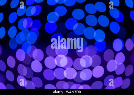 Blurred circles produced by a lens in the out of focus parts of an image. Stock Photo