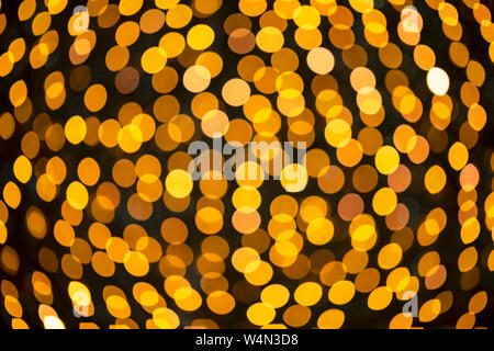 Blurred circles produced by a lens in the out of focus parts of an image. Stock Photo