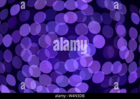 Blurred circles produced by a lens in the out of focus parts of an image. Stock Photo