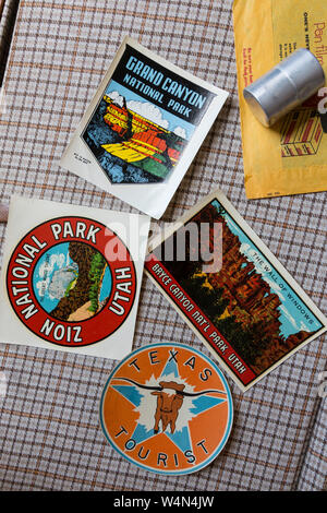 Retro Travel Stickers on An Open Suitcase Interior, USA Stock Photo
