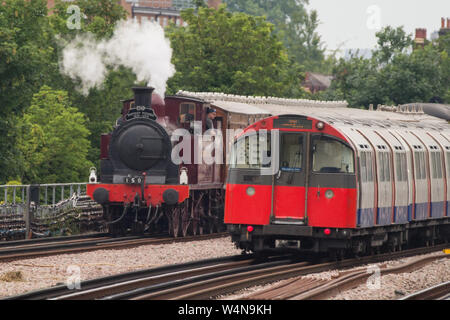 Marking the 150th anniversary of the District line, a steam train runs along parts of the London Underground. This will be the last time steam trains are expected to travel into central London on the Underground network, due to signalling modernisation.  Featuring: Atmosphere, View, District Line Where: London, United Kingdom When: 23 Jun 2019 Credit: Wheatley/WENN Stock Photo