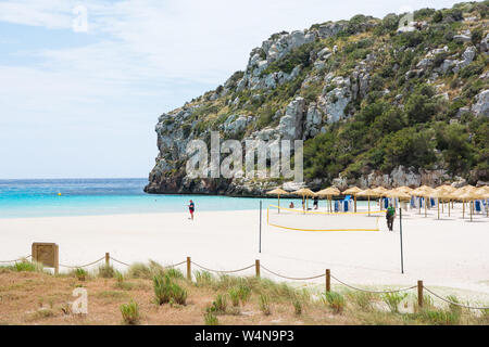 People arriving to Cala en Porter beach, Menorca Stock Photo