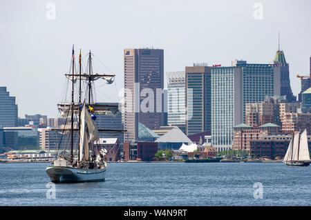 Stern and starboard view of a three-masted schooner, on a sunny day, participating in the Parade of Sail on the Chesapeake Bay, Baltimore, Maryland, May 4, 2006. From the Homewood Photography Collection. () Stock Photo