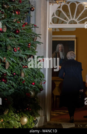 London, UK. 10th Dec, 2018. File photo taken on Dec. 10, 2018 shows British Prime Minister Theresa May arriving at 10 Downing Street after making a statement to the House of Commons in London, Britain. Newly-elected Conservative Party leader Boris Johnson took office as the British prime minister on Wednesday amid the rising uncertainties of Brexit. The latest development came after Theresa May formally stepped down as the leader of the country and Johnson was invited by the Queen to form the government. Credit: Han Yan/Xinhua/Alamy Live News Stock Photo