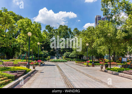 Panorama of Park Garden, Jardim Luis de Camoes with central monument. Santo António, Macao, China. Asia. Stock Photo