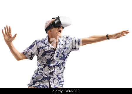 Excited senior man using a VR headset isolated on white background Stock Photo