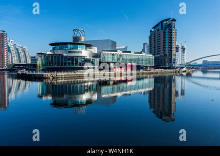 The Lowry Arts Centre and the Imperial Point apartment block, over the Manchester Ship Canal, Salford Quays, Manchester, UK Stock Photo