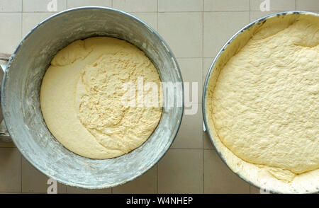 Closeup of yeast dough in production. yeast dough preparation process for baking Stock Photo
