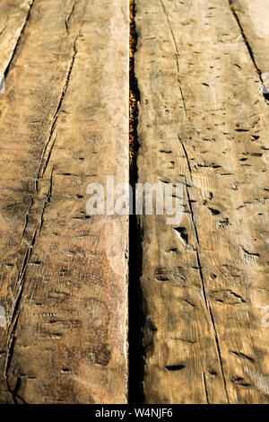 Close up of the old wooden table made from old wooden planks Stock Photo