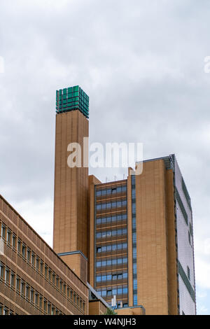 Marlene Dietrich Platz, Berlin, Germany - july 07, 2019:  detail of the Atrium tower building with it´s chimney with green cube on top Stock Photo