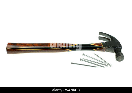 Old traditional curved claw hammer and nail on white background Stock Photo