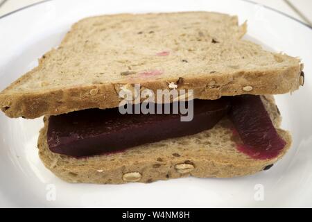 Beetroot Sandwich on Brown Sliced Bread Stock Photo