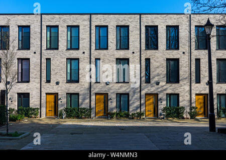 Town houses in the Timekeepers Square development, off Chapel Street, Salford, Manchester, England, UK Stock Photo