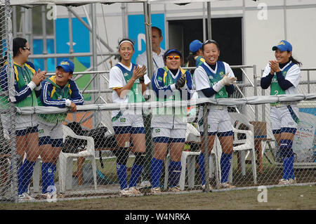 Rio de Janeiro, Brazil, July 26, 2007. Softball players from Brazil during the Brazil / USA game by the Pan American at the Deodoro Sports Complex in Stock Photo