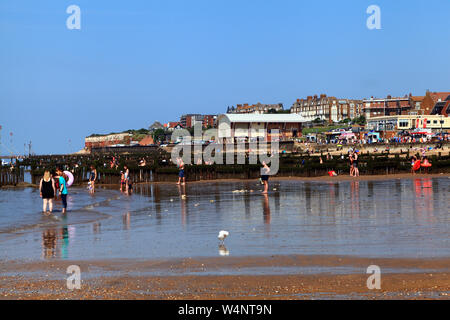 Hunstanton, seaside resort, beach, town, striped cliffs, holiday makers, visitors, tourists, Norfolk, England, UK Stock Photo