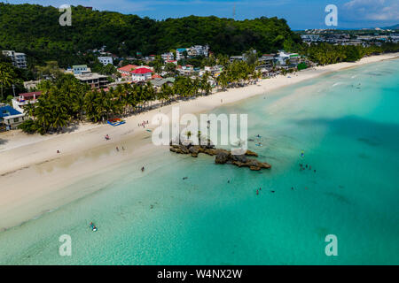 Aerial view of the famous White Beach and Willy's Rock on Boracay island in the Philippines Stock Photo