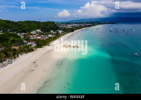 Aerial view of the famous White Beach and Willy's Rock on Boracay island in the Philippines Stock Photo