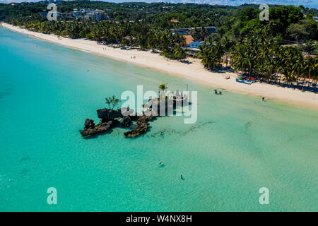 Aerial view of the famous White Beach and Willy's Rock on Boracay island in the Philippines Stock Photo