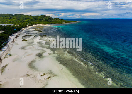 Aerial drone view of a large sandy beach in Anda, Bohol, Philippines Stock Photo