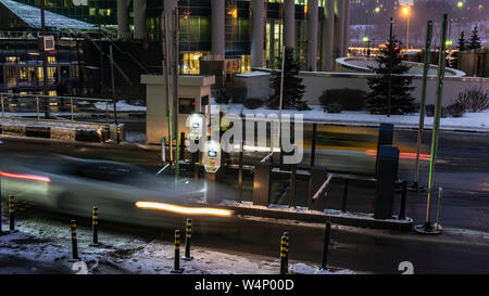 Entry and exit of paid Parking in the business center at the end of the working day Stock Photo