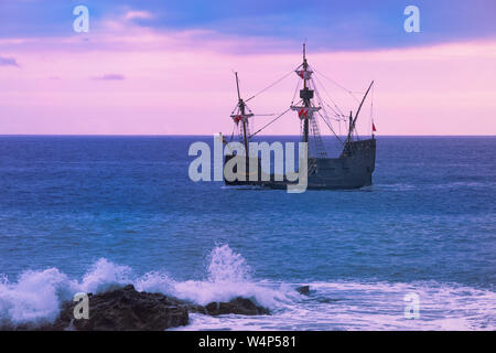 Santa Maria de Colombo in open sea at sunset - the replica of Christopher Columbus’s flagship “SANTA MARIA”, built on Portuguese island of Madeira at Stock Photo