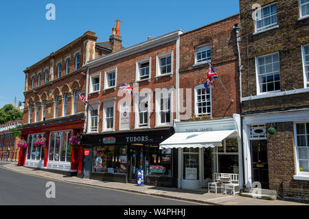 Old buildings in, Eton, Berkshire, UK. 23rd July, 2019. Simon James Hairdressers, Tudors Store used by Eton College Boys and Tom Brown Tailors. Credit Stock Photo
