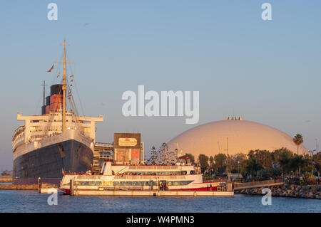 Image of the RMS Queen Mary retired ocean liner and Geodesic Dome. The iconic ship is currently a floating hotel. Stock Photo