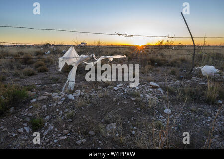 Plastic Tangled in a Barbed Wire Fence in Hobbs, New Mexico, USA Stock Photo