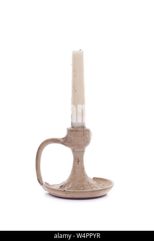 Candle on ceramic holder isolated on white Stock Photo