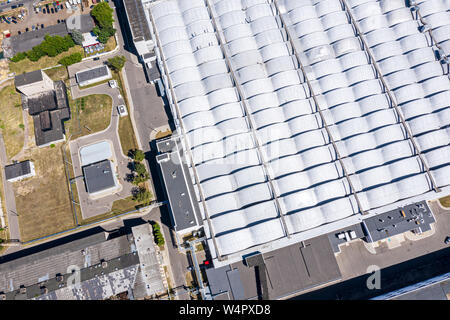 city industrial area. top view of roof of modern factory Stock Photo