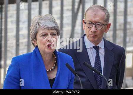 London, UK. 24th July, 2019. British Prime Minister Theresa May and her husband Philip May speaks to media outside Number 10 of Downing Street in London. Credit: SOPA Images Limited/Alamy Live News Stock Photo