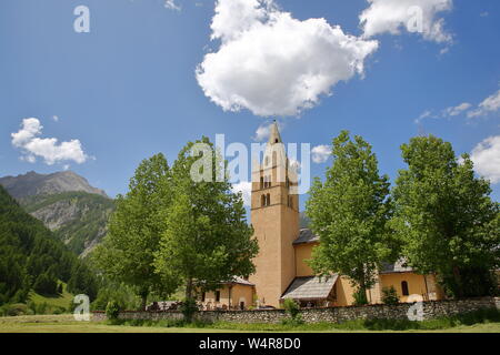 Saint Laurent church in Arvieux village, Queyras Regional Natural Park, Southern Alps, France Stock Photo