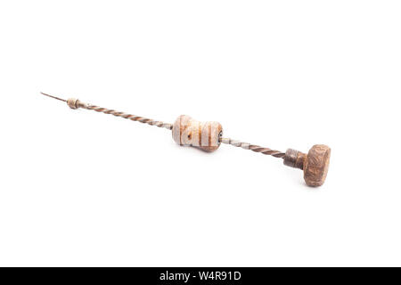 Antique drill bit isolated on white background Stock Photo