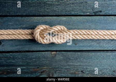 Nautical rope knot. Square knot isolated on white background. Stock Photo